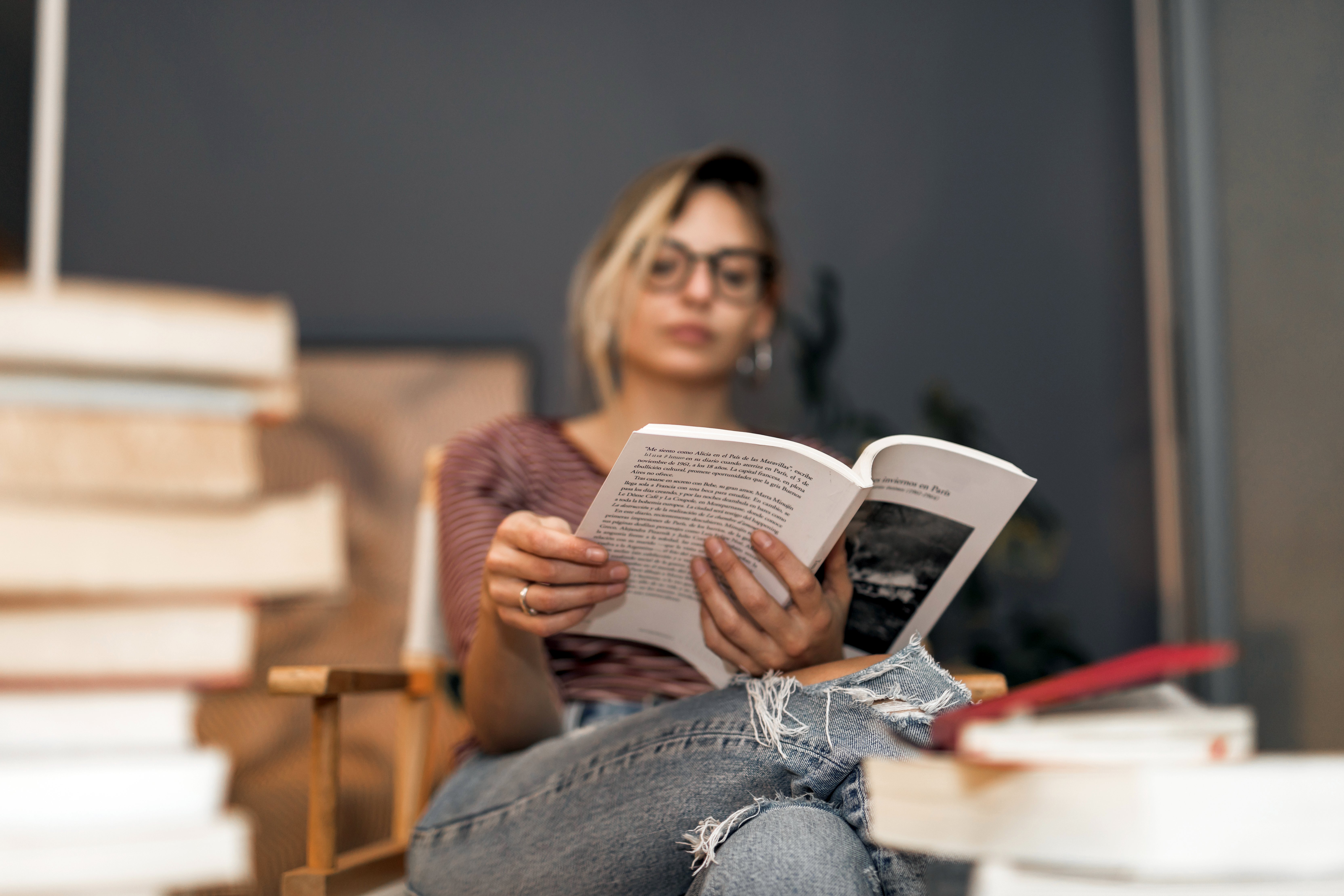 A personalized self-discovery book on a desk with a notebook.