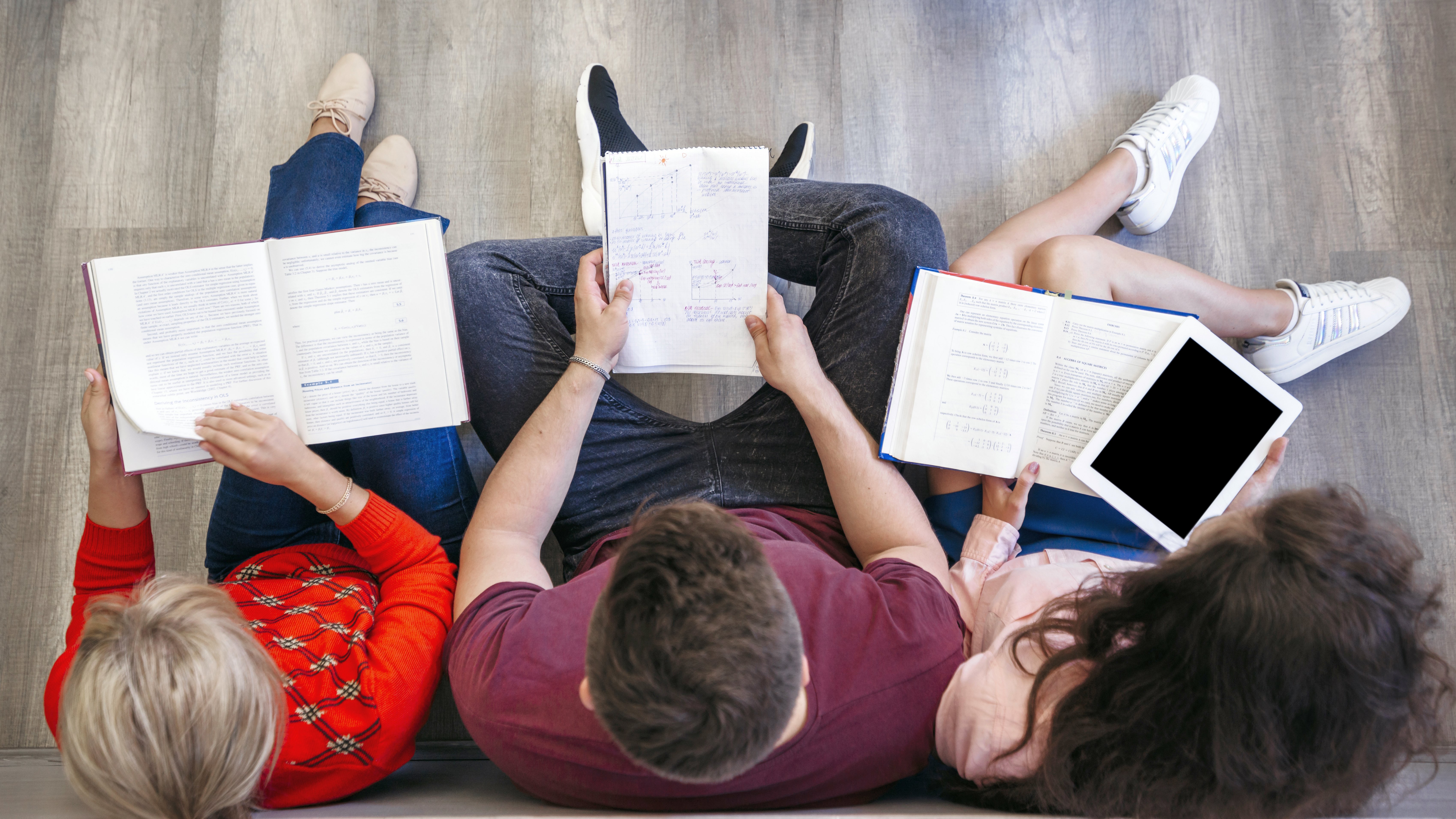 An open personalized book resting on a soft blanket.